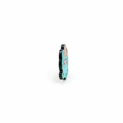 Century Fancy Beads Pokémon enamel lapel pin featuring a cute teal character with a pink hat, side profile view.